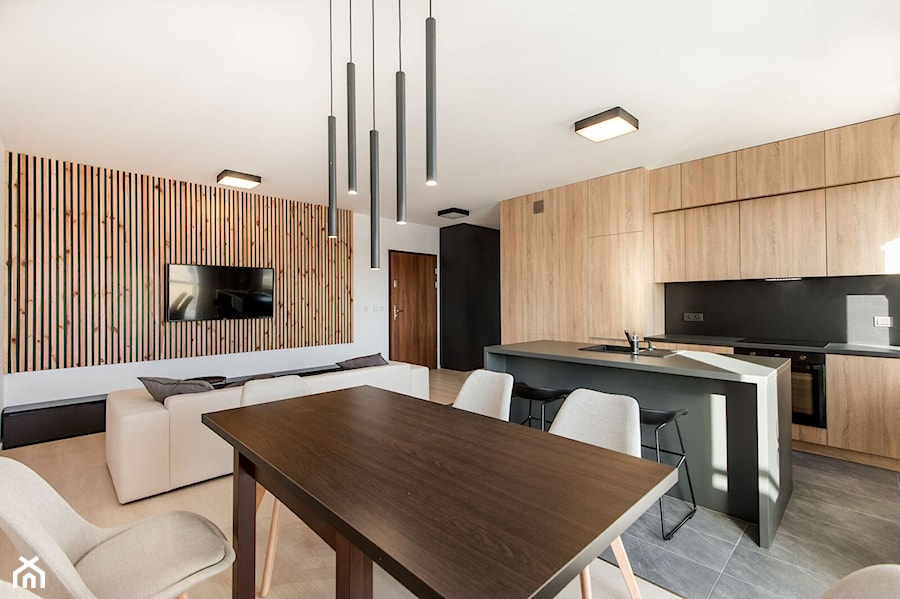 Realizacja Nowoczesny Minimalizm - Średni czarny szary salon z kuchnią z jadalnią - zdjęcie od DISENO INTERIORS - Apartamenty PREMIUM