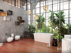 Łazienka w stylu industrialnym, z betonową ścianą i zielenią