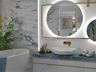 Niebiesko biała łazienka ze złotym akcentem 