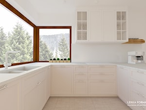Elegancka beżowa kuchnia z kamiennym blatem - zdjęcie od Lekka Forma - pracownia projektowa