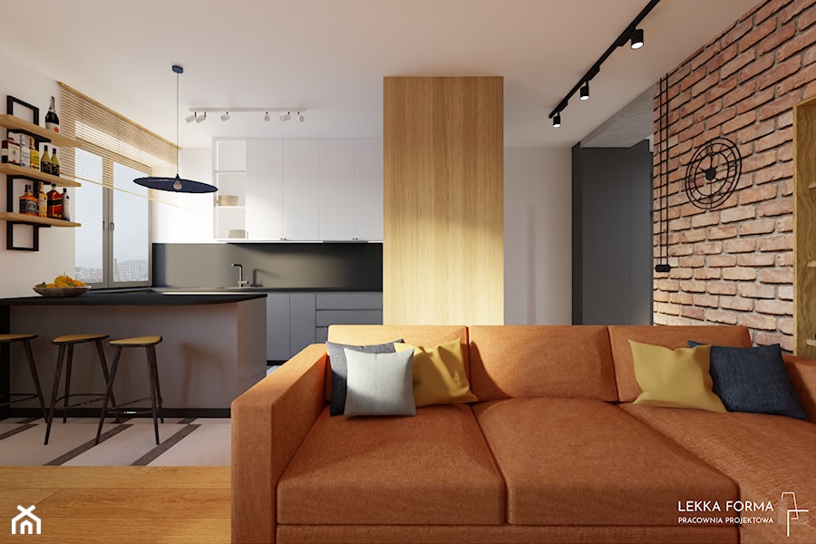 Loftowy salon z pomarańczową kanapą - zdjęcie od Lekka Forma - pracownia projektowa