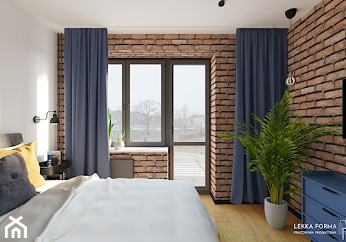 Sypialnia z cegłą i granatowymi akcentami - zdjęcie od Lekka Forma - pracownia projektowa