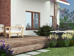 Fragment ogrodu z kwitnącą rabatą bylinową i trawami - Ogród, styl skandynawski - zdjęcie od Małe zielone studio