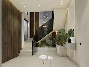 Projekt klatki schodowej w wiatrołapie z szafą dla gości i siedziskiem. - zdjęcie od Honest Studio projektowanie wnętrz