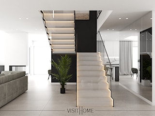 Dom z antresolą - nowoczesny korytarz w kolorze czarno białym
