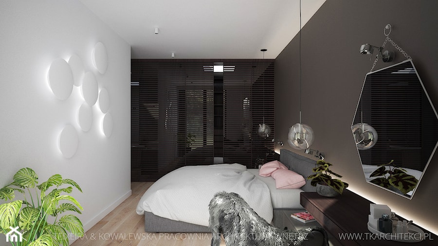 Średnia biała czarna z panelami tapicerowanymi sypialnia z garderobą, styl nowoczesny - zdjęcie od TK Architekci