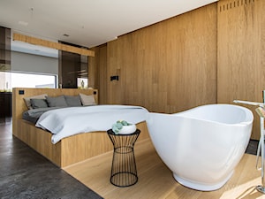 sypialnia połączona z łazienką - zdjęcie od TK Architekci