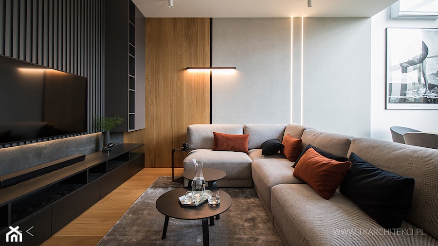Przytulny Apartament - Duży beżowy brązowy czarny szary salon z jadalnią, styl nowoczesny - zdjęcie od TK Architekci