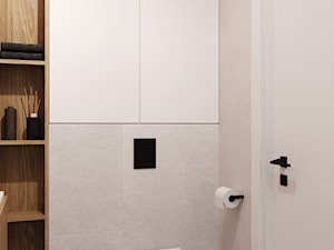 Szaro- beżowa łazienka z dodatkiem drewna, czarnych akcentów i pomarańczowego koloru. - zdjęcie od VILAR Interiors