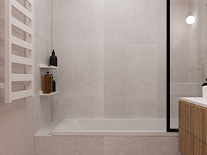 Szaro- beżowa łazienka z dodatkiem drewna, czarnych akcentów i pomarańczowego koloru. - zdjęcie od VILAR Interiors