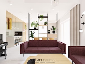 Eklektyczny salon z betonową podłogą - zdjęcie od Karmeli Studio