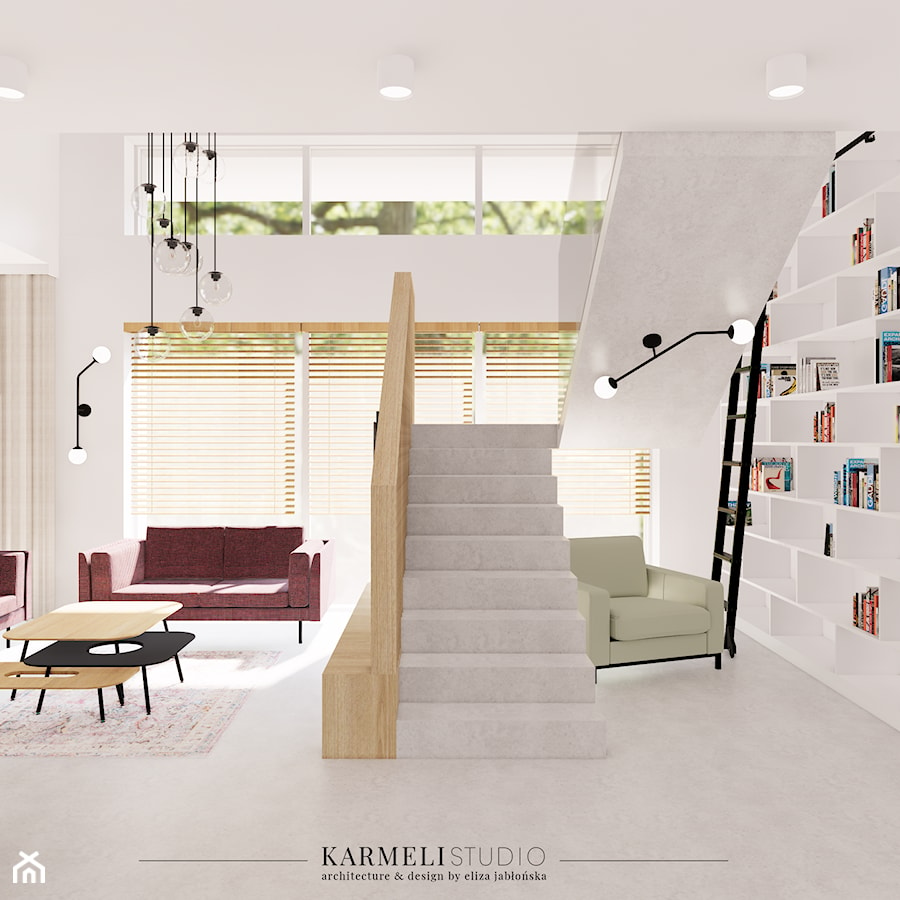 Biblioteka w salonie z betonową podłogą - zdjęcie od Karmeli Studio