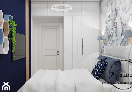 Sypialnia z granatem i tapetą - zdjęcie od Pracownia projektowania wnętrz Wymiary