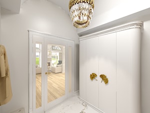 Wiatrołap w Rezydencji Parkowej - reprezentacyjny jasny, biały przedpokój z szafą w domu jednorodzinnym, w stylu hampton/klasycznym - zdjęcie od Tucholscy Kreatywnie
