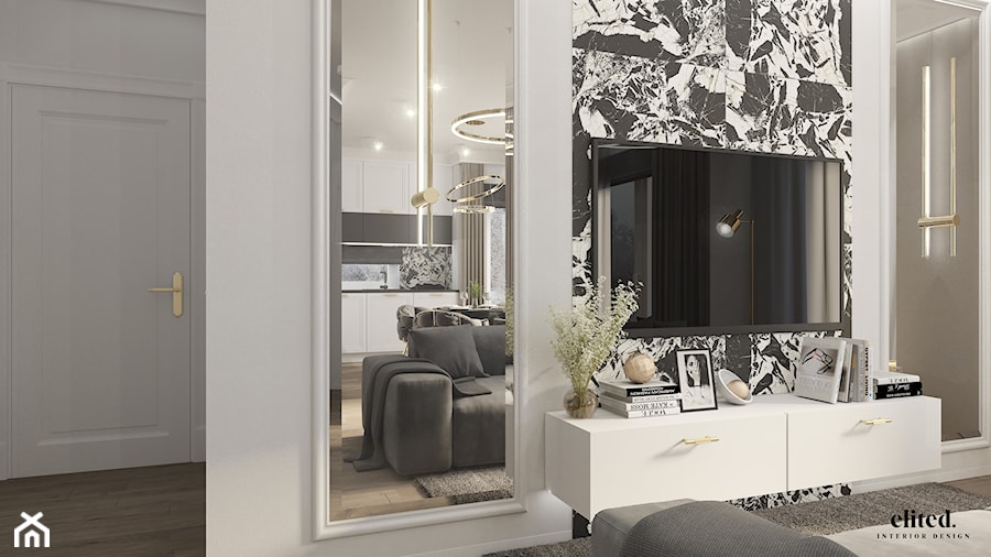 Elegancki salon ze sztukaterią, fazowanymi lustrami oraz złotymi dodatkami - zdjęcie od Elited Interior Design