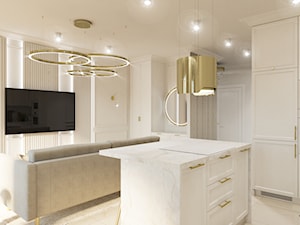 Biała, elegancka kuchnia z widokiem na salon - zdjęcie od Elited Interior Design