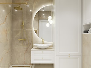 Elegancka beżowa łazienka ze złotymi dodatkami - zdjęcie od Elited Interior Design