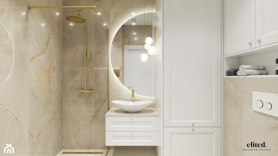 Elegancka beżowa łazienka ze złotymi dodatkami - zdjęcie od Elited Interior Design