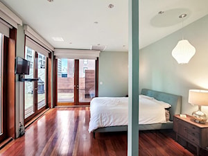 Biokominki Infire - Duża szara sypialnia z balkonem / tarasem, styl minimalistyczny - zdjęcie od Ambusto Polska
