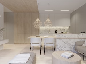 Jasny salon z kuchnią i jadalnią - zdjęcie od Infinity Interior Design