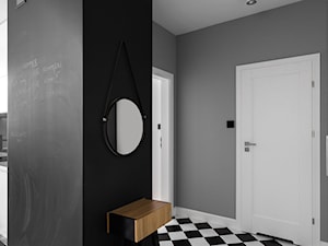 Mieszkanie w Warszawie / IN PRACOWNIA - Średni czarny szary hol / przedpokój, styl minimalistyczny - zdjęcie od WWW.NIEWFORMIE.PL