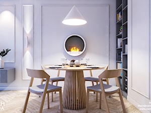 Nowoczesa jadalnia z okrągłym stołem i biokominkiem - zdjęcie od CONTECH Architektura