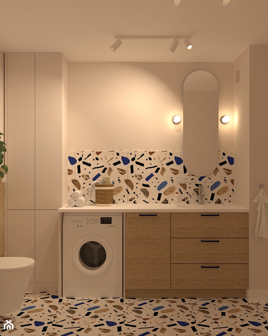 Wc w domu z płytkami lastryko i owalnym lustrem. - zdjęcie od Kolorowy projekt Katarzyny - projektowanie wnętrz