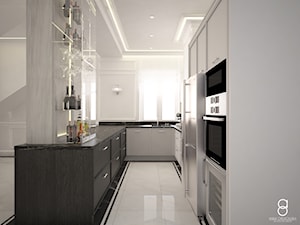 Apartament Zabrze - Średnia zamknięta biała z zabudowaną lodówką kuchnia w kształcie litery u z oknem z marmurem nad blatem kuchennym, styl glamour - zdjęcie od ANNA ORLIKOWSKA ARCHITEKTURA WNĘTRZ