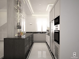 Apartament Zabrze - Średnia zamknięta z salonem biała z zabudowaną lodówką z podblatowym zlewozmywakiem kuchnia w kształcie litery u z oknem z marmurem nad blatem kuchennym, styl glamour - zdjęcie od ANNA ORLIKOWSKA ARCHITEKTURA WNĘTRZ