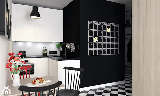 kalendarz na ścianie, czarna ściana, białe meble, czarna lampa, czarne krzesła