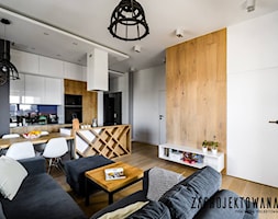 Apartament w stylu skandynawskim - Średni biały salon z kuchnią z jadalnią, styl nowoczesny - zdjęcie od ZAPROJEKTOWANA - Homebook