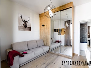 Apartament w stylu skandynawskim - Średnia biała z biurkiem sypialnia, styl skandynawski - zdjęcie od ZAPROJEKTOWANA