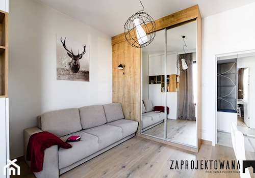 Apartament w stylu skandynawskim - Średnia biała z biurkiem sypialnia, styl skandynawski - zdjęcie od ZAPROJEKTOWANA
