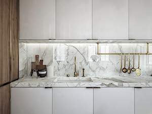 Mieszkanie na Powiślu - Średnia z kamiennym blatem biała z zabudowaną lodówką z podblatowym zlewozmywakiem kuchnia w kształcie litery l z kompozytem na ścianie nad blatem kuchennym, styl nowoczesny - zdjęcie od Wiktoria Ginter