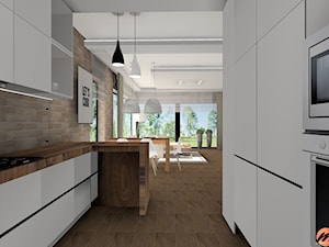 Aranżacja wnętrza z cegłą - Średnia otwarta z salonem z zabudowaną lodówką kuchnia w kształcie litery u, styl nowoczesny - zdjęcie od Studio M Kropki. Projektowanie wnętrz i form użytkowych.