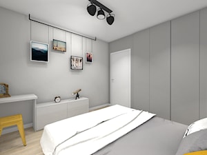 Mieszkanie podróżników - Mała szara z biurkiem sypialnia - zdjęcie od Studio FORMAT HOME