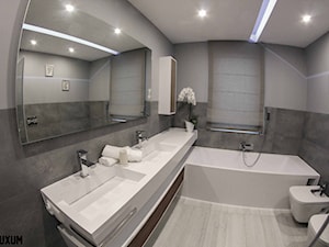 Nowoczesna łazienka w szarościach od LUXUM - zdjęcie od Luxum