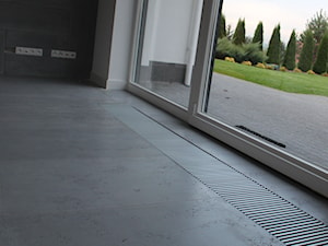Płyty z betonu architektonicznego idealnie nadają się również na podłogi. - zdjęcie od Luxum