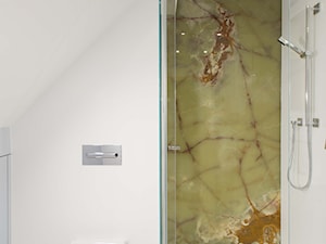 Corian na ścianach tworzy higieniczne, trwałe i bezfugowe powierzchnie. Wykonanie firmy Luxum. - zdjęcie od Luxum