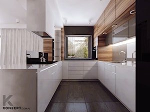 Cechowa - Średnia otwarta z salonem beżowa czarna szara z zabudowaną lodówką z podblatowym zlewozmywakiem kuchnia w kształcie litery u z oknem, styl minimalistyczny - zdjęcie od KONZEPT Architekci