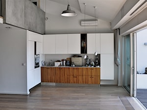Mieszkanie Kraków. Minimalistyczna kuchnia z salonem + balkon. - Kuchnia, styl minimalistyczny - zdjęcie od Studio Podłóg Grodex