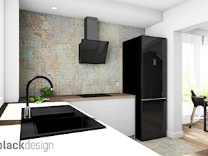 Biała kuchnia + czarne AGD / drewno + Aparici Carpet - zdjęcie od black design