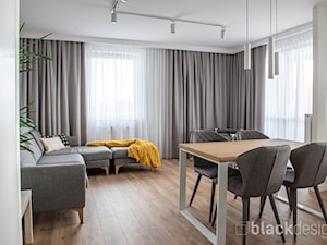 Białystok Mieszkanie 67 m2 - Średni biały szary salon z kuchnią z jadalnią, styl skandynawski - zdjęcie od black design