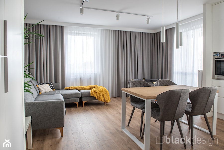 Białystok Mieszkanie 67 m2 - Średni biały szary salon z kuchnią z jadalnią, styl skandynawski - zdjęcie od black design