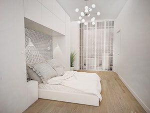 Koncepcja aparatamentu w Legnicy- Szewczenko Development - Średnia biała sypialnia z łazienką, styl minimalistyczny - zdjęcie od Musiał Studio