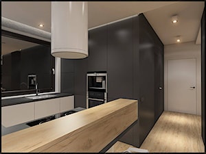 Dom jednorodzinny po Wrocławiem - Otwarta z zabudowaną lodówką z nablatowym zlewozmywakiem kuchnia w kształcie litery u, styl minimalistyczny - zdjęcie od CUDO STUDIO
