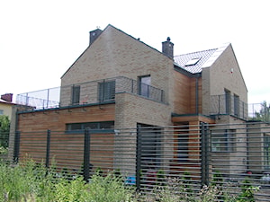 WARSZAWA - Jednopiętrowe nowoczesne domy willowe jednorodzinne murowane z dwuspadowym dachem, styl nowoczesny - zdjęcie od Nowak i Nowak Architekci
