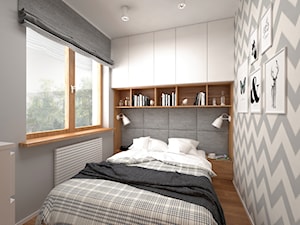 Projekt mieszkania 30 m2 / Kraków - Mała biała szara z panelami tapicerowanymi sypialnia, styl skandynawski - zdjęcie od BIG IDEA studio projektowe