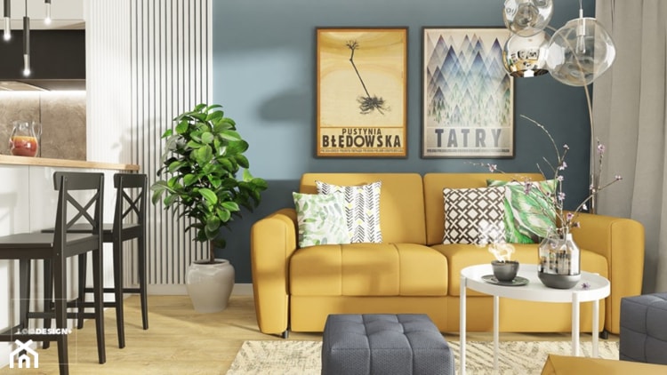 Żółta sofa Olbia (Gala Collezione) w otoczeniu neutralnych kolorów, gra w tym salonie główną rolę – projekt wnętrza Łukasza Święcickiego z biura projektowego løøDESIGN+