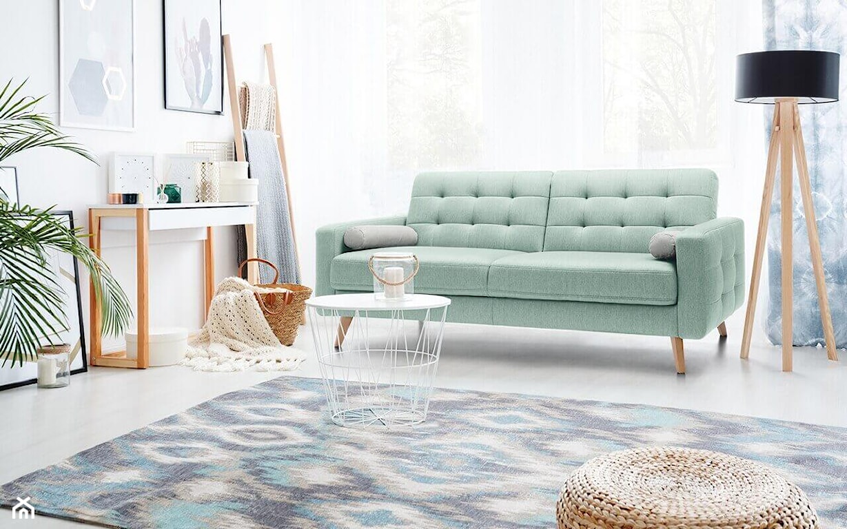 salon w stylu skandynawskim z miętową sofą